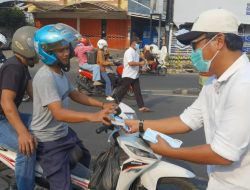 IJP Lampung Bagikan 3.000 Masker kepada Pengendara di Tugu Adipura